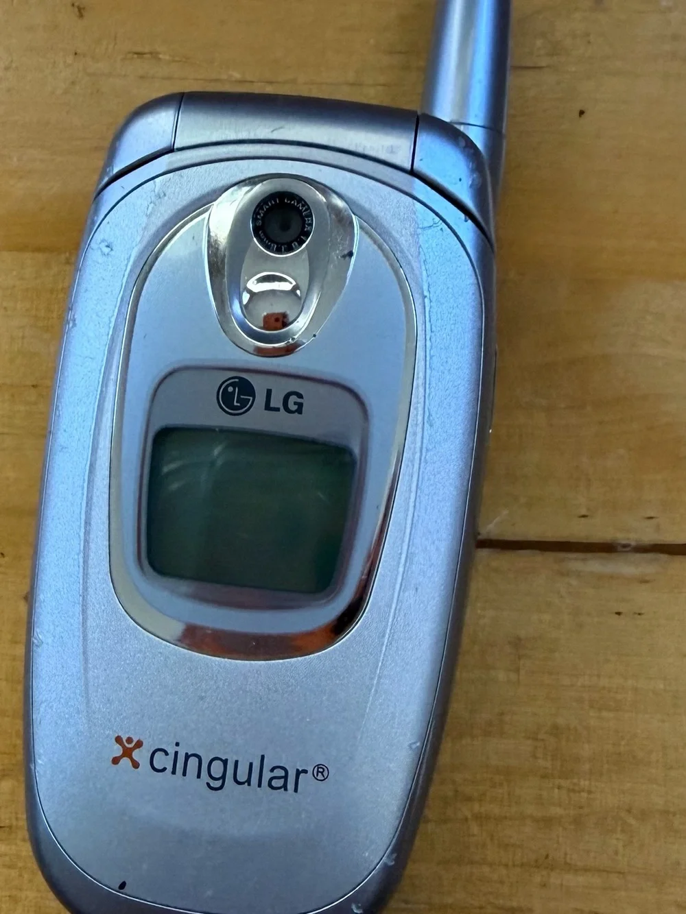 LG Silver Flip Phone with External Display and Antenna